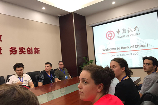 Students watching a presentation about Bank of China